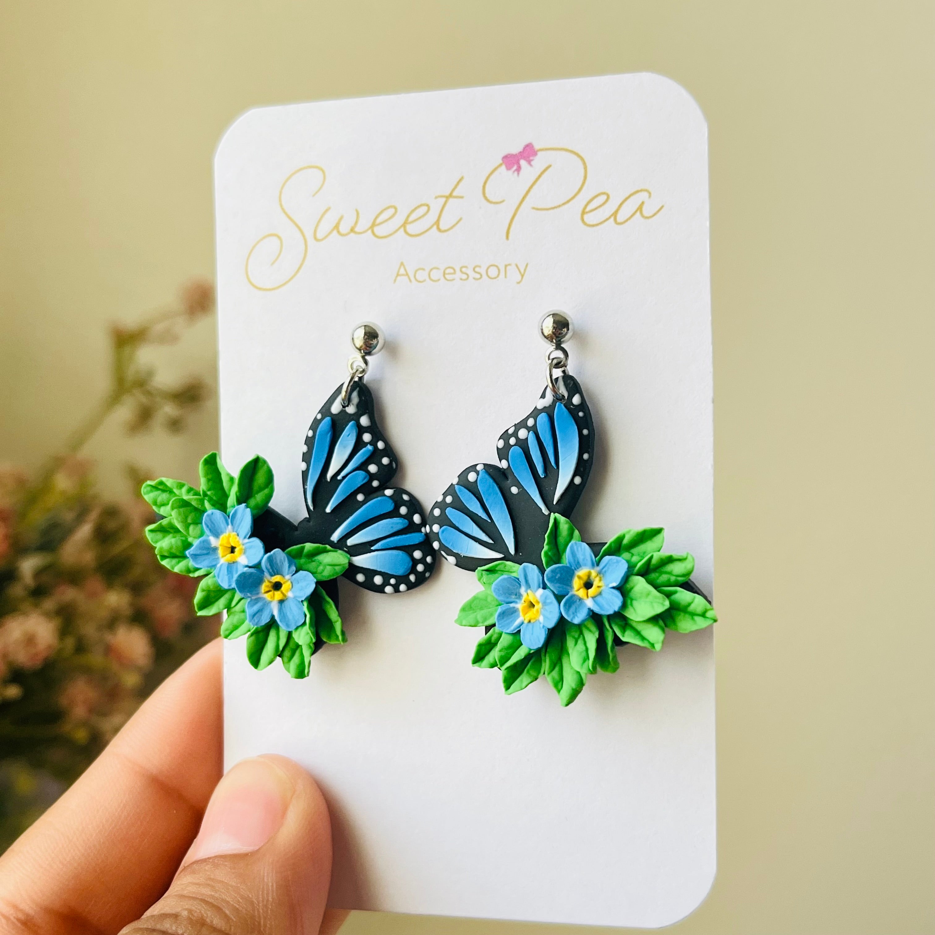 Blue butterfly and forget me not