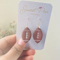 Football dangles