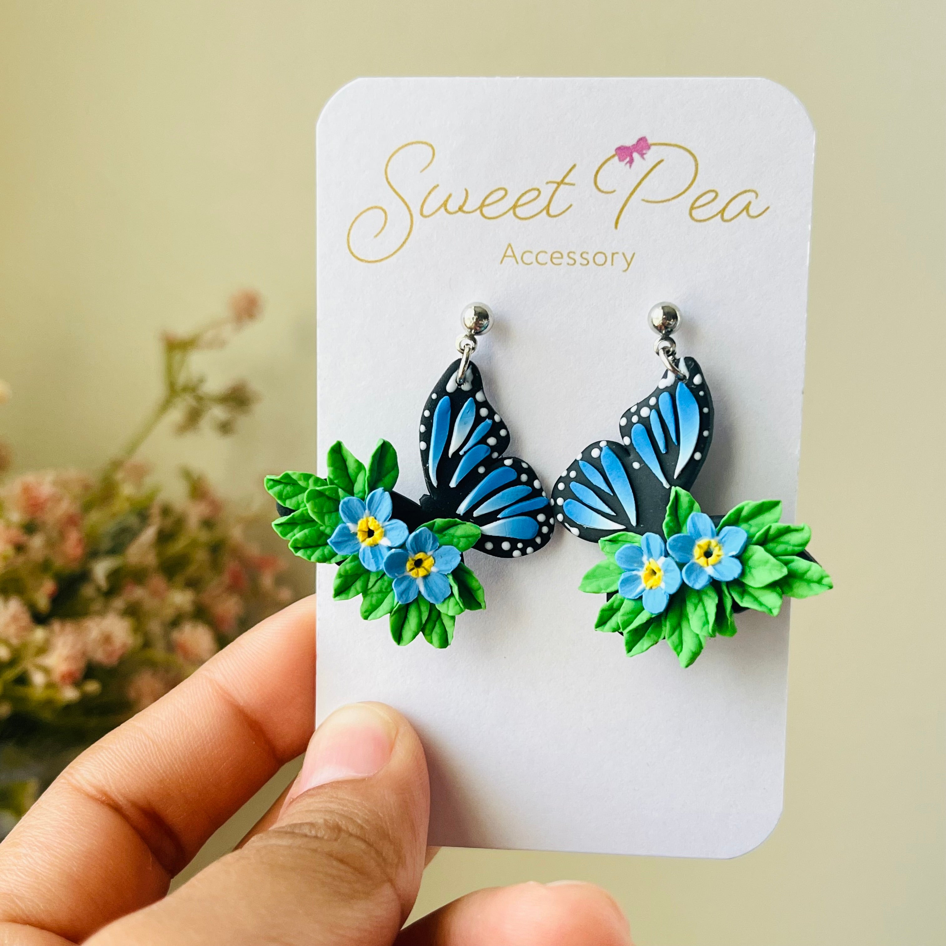 Blue butterfly and forget me not